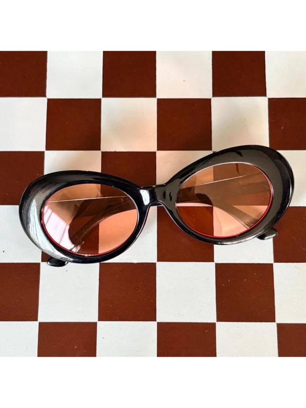 black clout goggles with orange tint